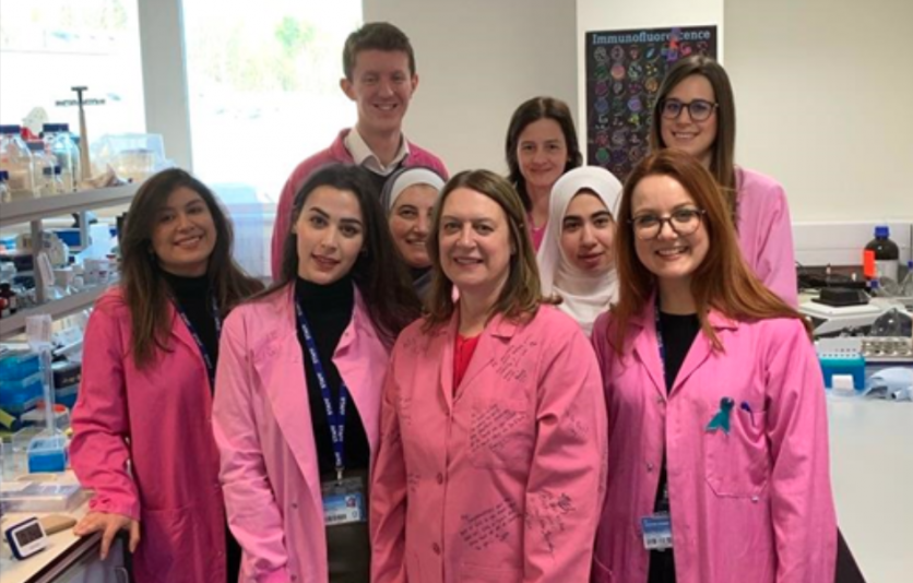 Dr. Melanie Flint with her lab team studying how stress hormones affect cancer progression.